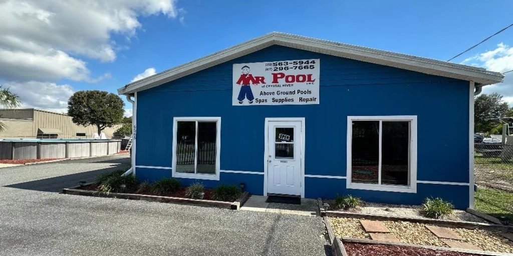 Blue building with pool supplies store